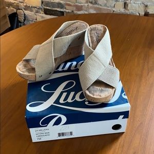 Lucky tan cork wedges